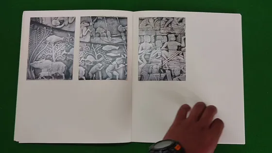 Hill of Poisonous Trees — spread, carved stone reliefs of battle