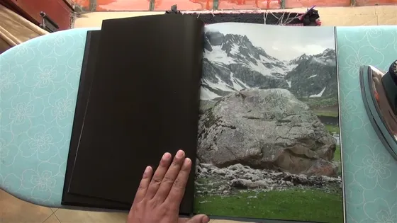 Joker — spread, a boulder beneath snow mountains