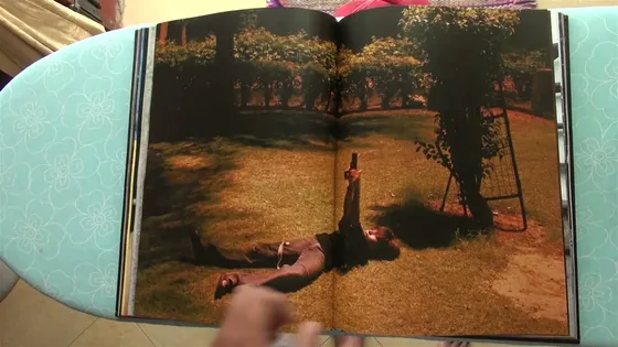 Joker — spread, a figure in an orchard at night