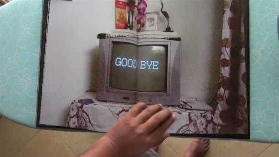 Joker — spread, a television reading GOOD BYE